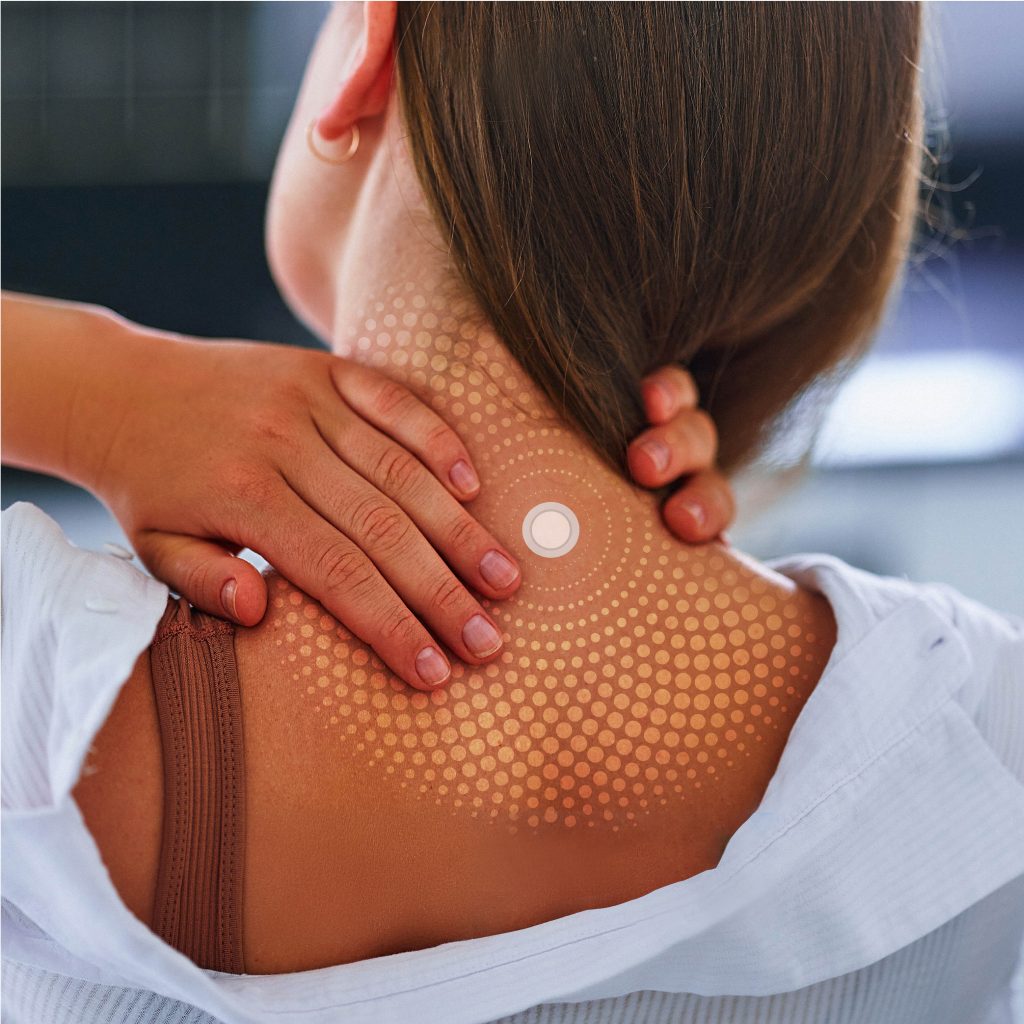 Woman wearing the patch on her neck